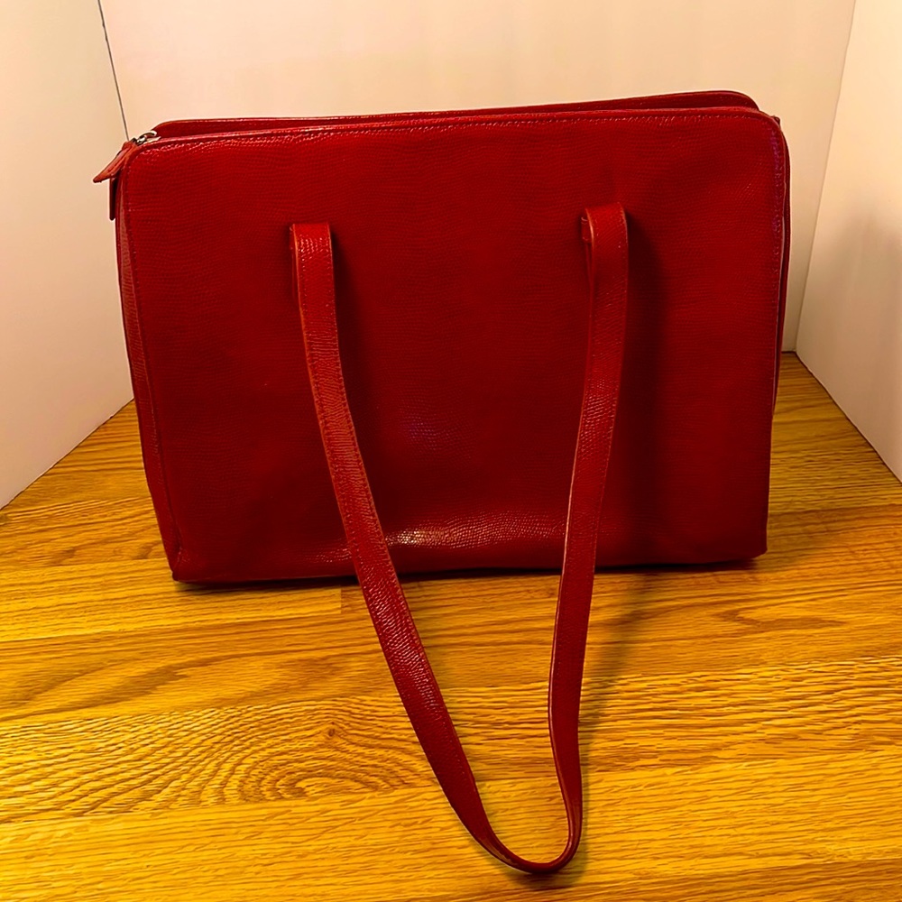 Mimi DiCarlo red purse.